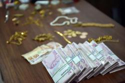 Yaşlı qadının sərnişin avtobusunda unutduğu çantadan "sərvət" çıxdı - FOTO