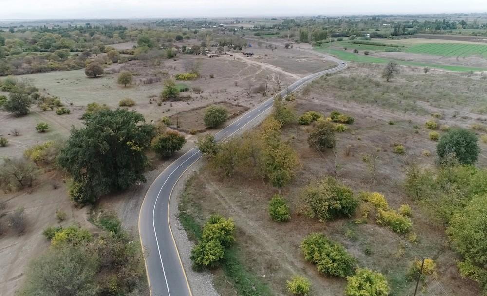 Prezident İlham Əliyev Ağdam rayonunda Quzanlı-İmamqulubəyli-Orta Qərvənd-Xındırıstan avtomobil yolunun açılışında iştirak edib - FOTO