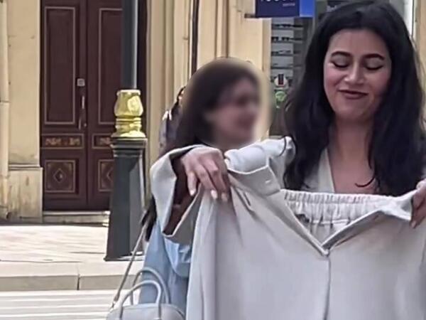 Bakıda qızı küçədə &quot;soyundurub&quot; reklam çəkdilər - VİDEO