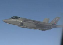 Putinin təyyarəsini F-22 qırıcıları müşayiət etdi - VİDEO