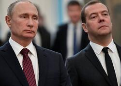 Putin Medvedevi təltif etdi