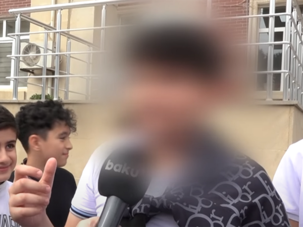 Məktəblini soyundurub videoya çəkiblər?