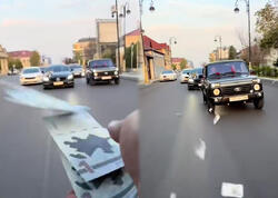 Toy karvanında “avtoş”luq edib yola pul səpdilər - <span class="color_red">VİDEO</span>