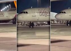 Əl yelləyib təyyarəni saxlatmaq istədilər - <span class="color_red">VİDEO</span>