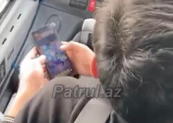 Sükan arxasında oyun oynayan avtobus sürücüsü işdən çıxarıldı