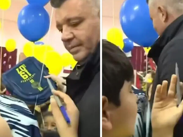 Formaya deyil, uşağın alnına imza atdı - <span class="color_red">VİDEO</span>