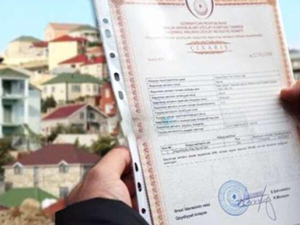 Xətaidə bina sakinləri 5 ildir çıxarış ala bilmirlər: 12 mərtəbə yerinə 13 mərtəbə tikilib?