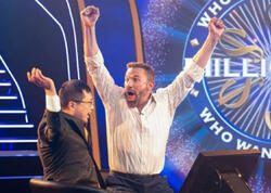Ben Afflek "Kim milyonçu olmaq istəyir?"də 1 milyon dollar qazandı - <span class="color_red">(Foto)</span>