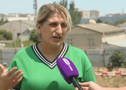Bakı sakini tikinti şirkəti tərəfindən evinə ziyan vurulduğunu iddia edir <span class="color_red">(Video)</span>