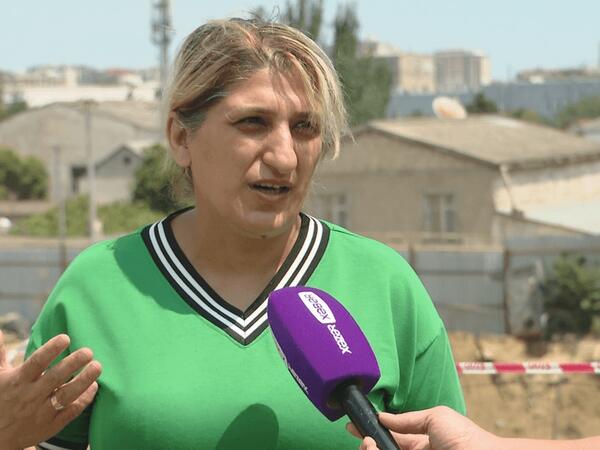 Bakı sakini tikinti şirkəti tərəfindən evinə ziyan vurulduğunu iddia edir <span class="color_red">(Video)</span>