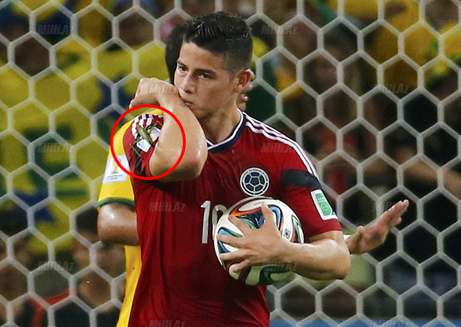 Colombia's Rodriguez celebrates after scoring a penalty against Brazil during their 2014 World Cup quarter-finals at the Castela